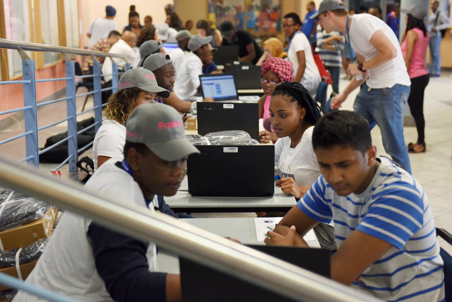 First-year NSFAS students receiving laptops sponsored by UCT at the PD Hahn building on upper campus.