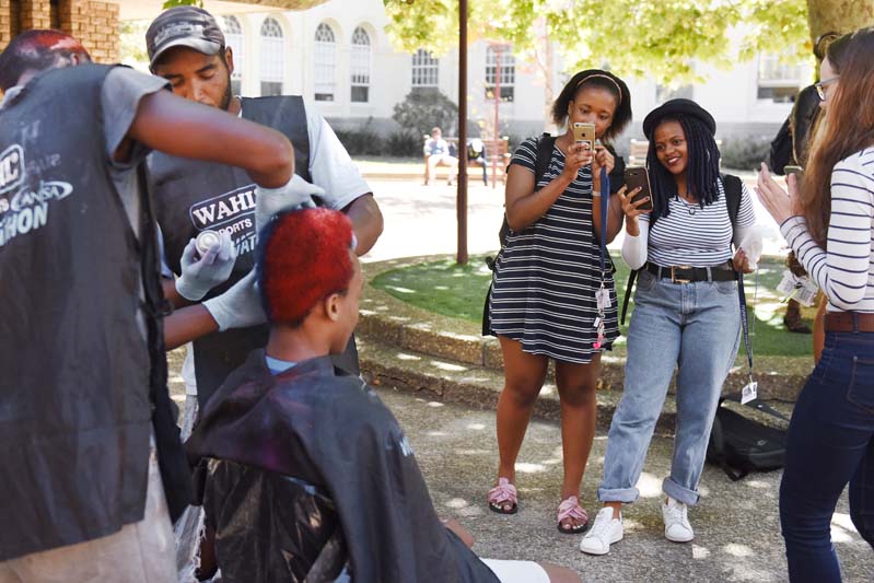 Students photograph their friend during the annual event at the Faculty of Health Sciences in Anzio Road, Observatory.