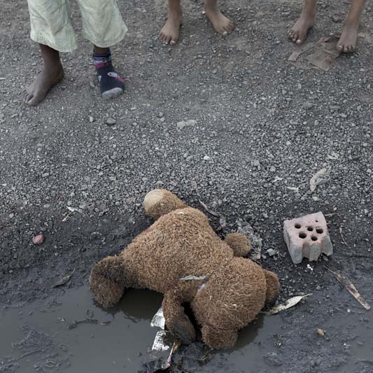 “This image speaks of innocence, and the undercurrent of violence the children are exposed to in socially challenged communities. This is in Egoli, one of the townships in the area. You are constantly reminded of the privilege of your own children, when you find and capture these kinds of images.”