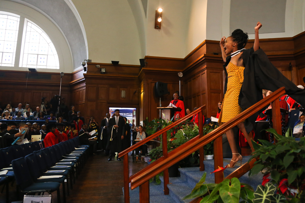 The pure joy of the graduation moment.