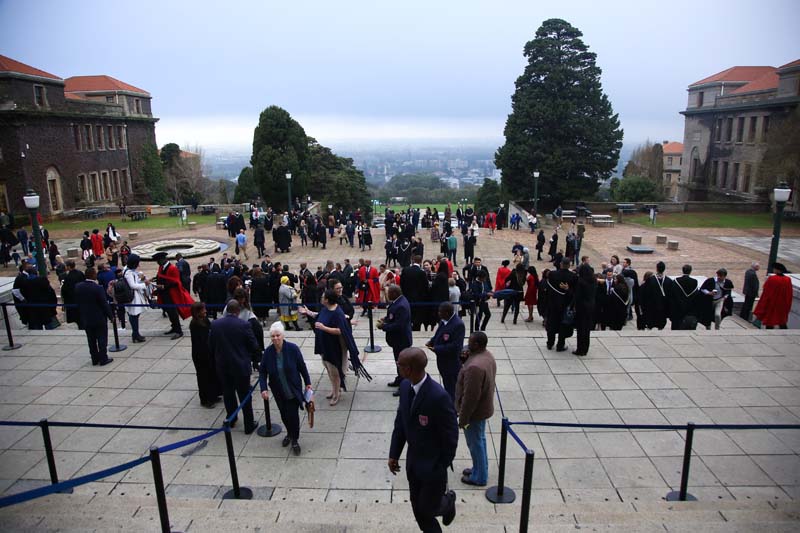 Graduands, family members, friends and supporters gathered outside Memorial Hall before the start of the winter graduation ceremony.