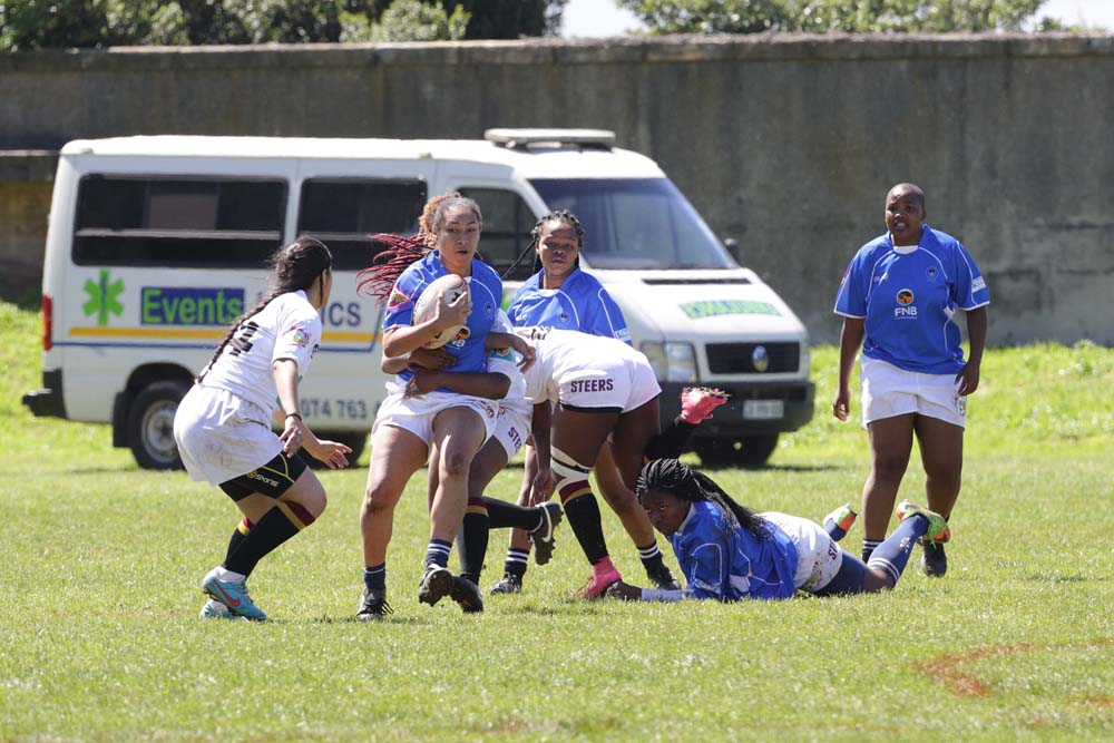 Women rugby players show the sport is definitely not a men-only domain.