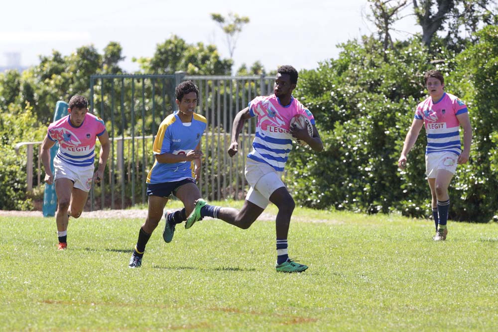 Grit and determination on the faces of UCT seven rugby players as they outrun their competition.