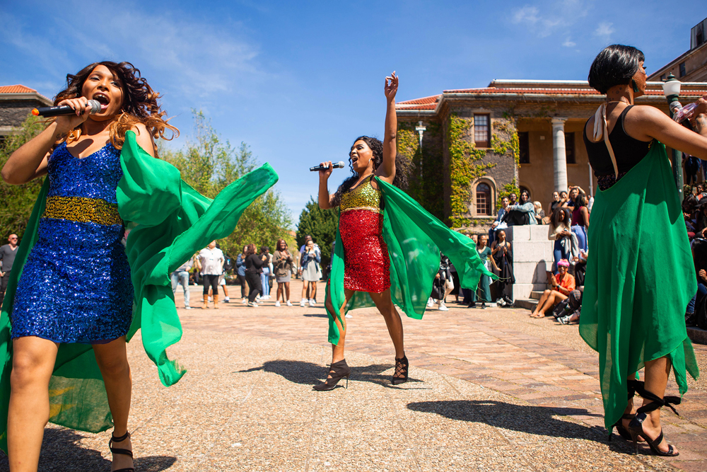 Rainbow Week kicks off with a dazzling lunch-time drag performance on the plaza by the 3 Divas, (from left) Tiara Skye, Kat Gillardi and Angel Lalamore.