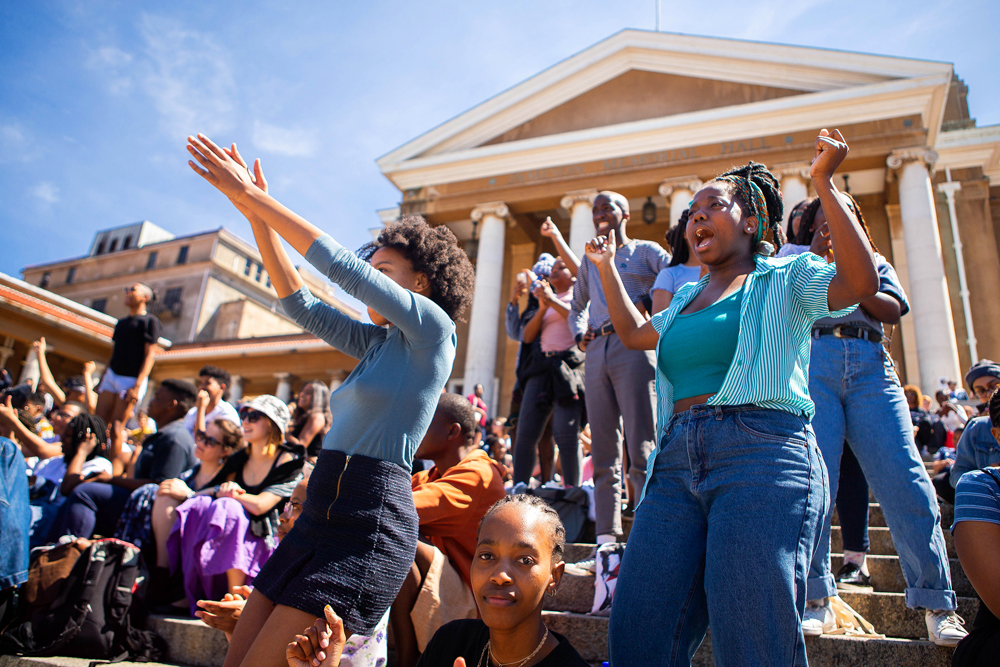 Students sing along and enjoy some fun in the sun as the 3 Divas perform.