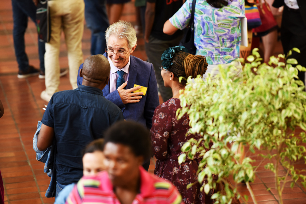 Dr Max Price engages with parents at the annual Parent Orientation event in the Leslie Social Science Building in 2017.