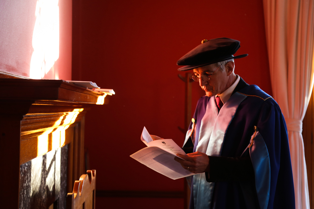 Dr Price takes a moment to collect his thoughts before a graduation ceremony in 2017.