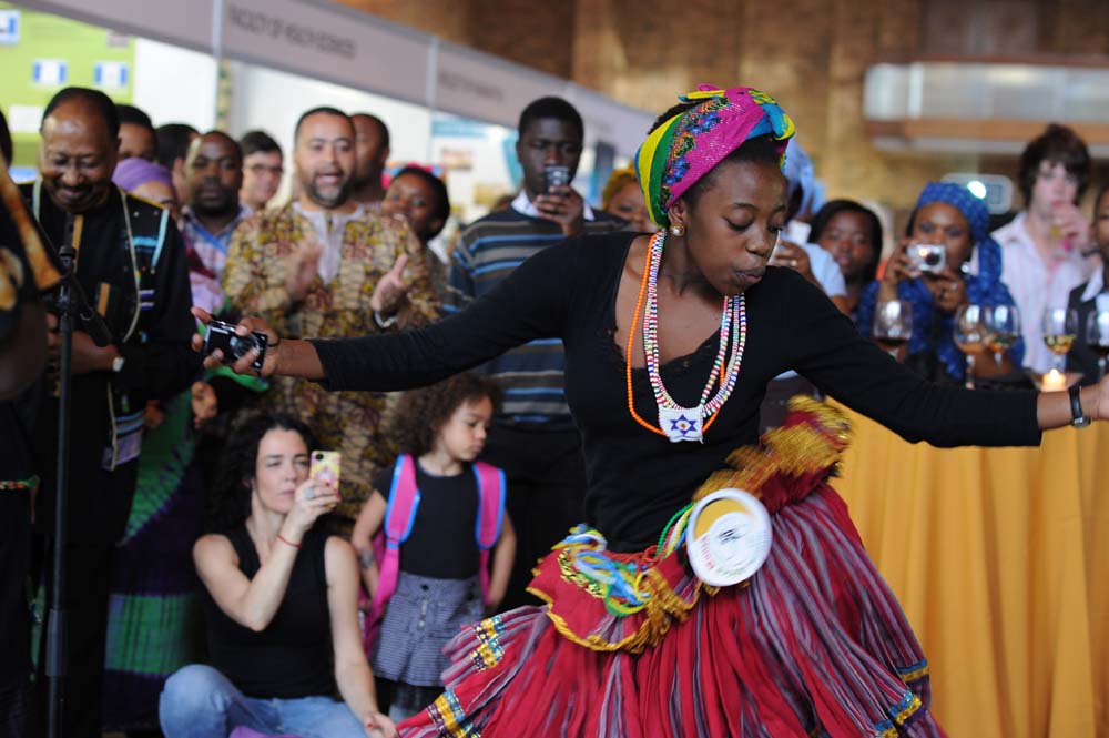 Nkateko Mnisi dances wearing the xibelani skirt at the Africa Month celebration at the Baxter Theatre on 24 May 2012.