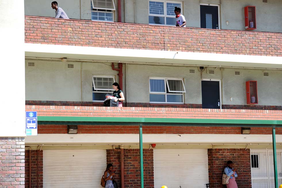 Students were seen with boxes and bags going into residences to pack. Many put their belongings in provided storage at their respective residences.