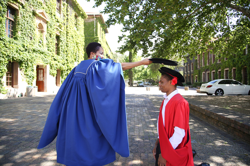 The summer graduation season was a virtual affair, but the VC did meet with some PhD graduates on campus to take some pictures.