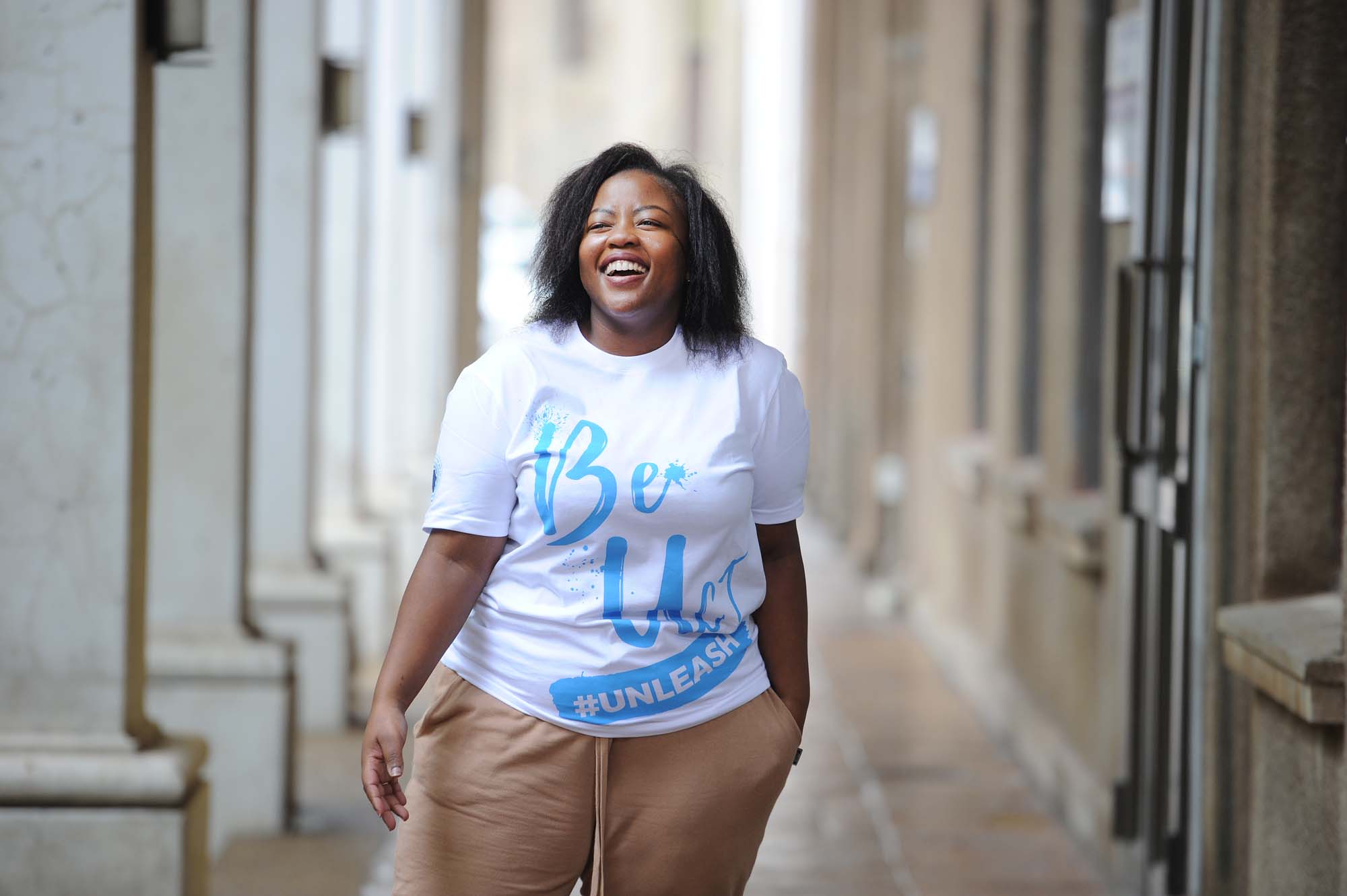 Noluthando Ticha-Ntsimango posing in their vision 2030 T-shirt at the Cissie Gool plaza. Photo Lerato Maduna.