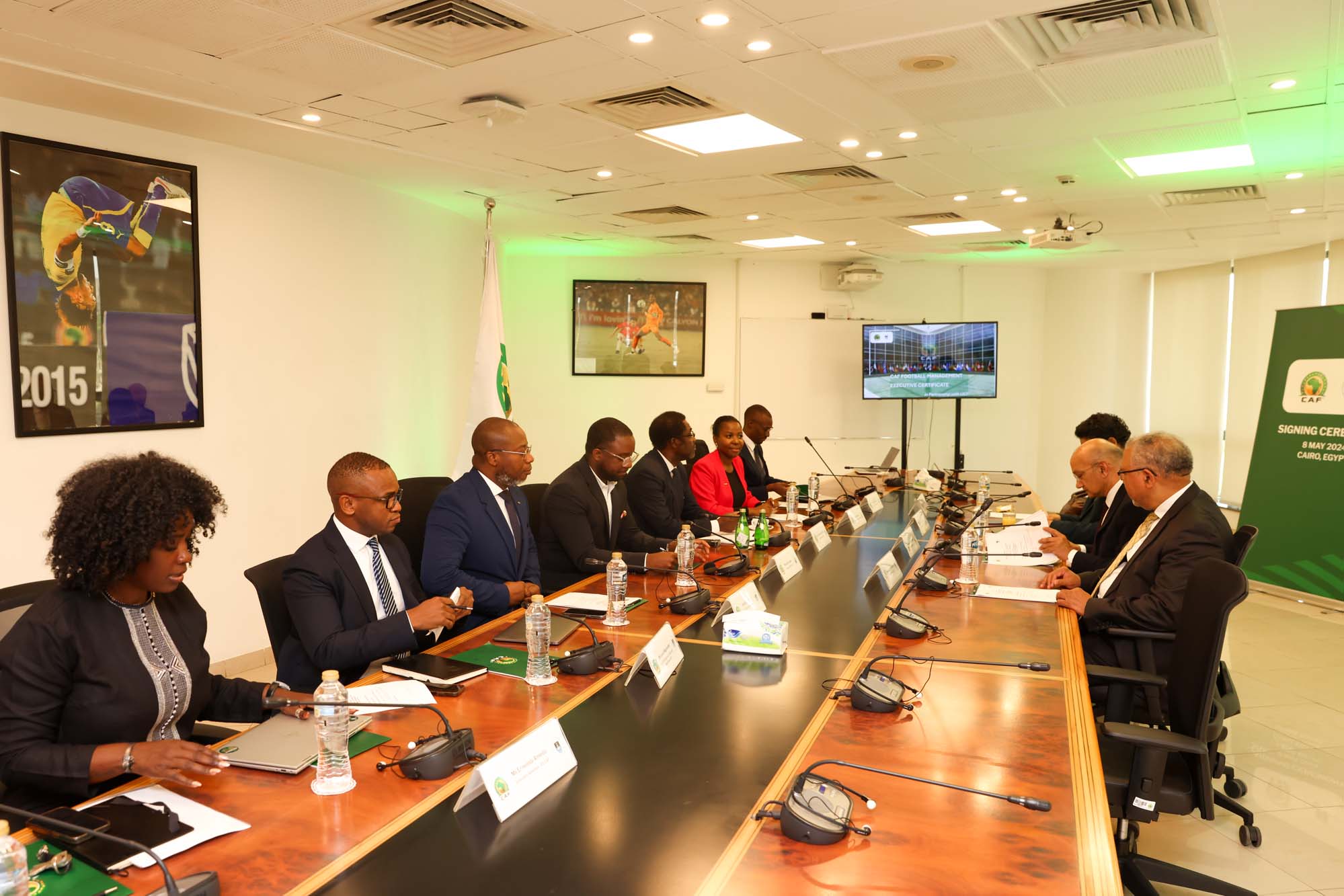CAF and UCT executive members in the CAF HQ boardroom.