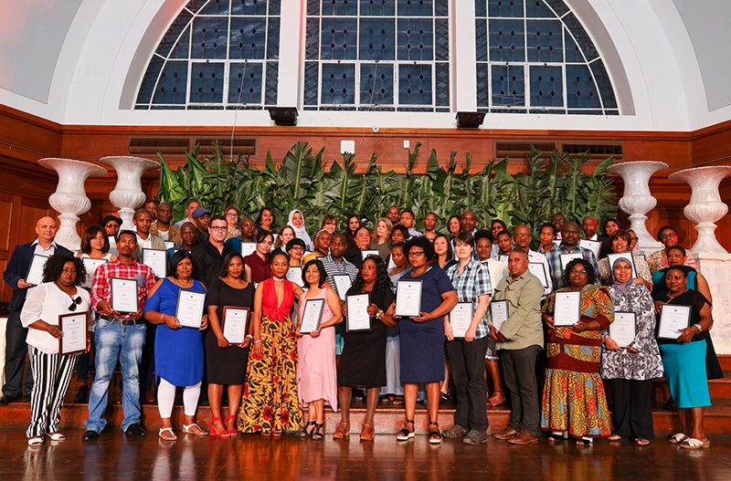 Prof Mamokgethi Phakeng with staff who received long-service awards for completing 15 years of service at UCT