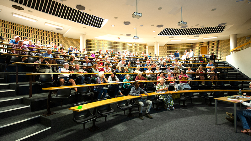 The audience listens attentively as Emer Prof Jan Glazewski delivers his fascinating story.