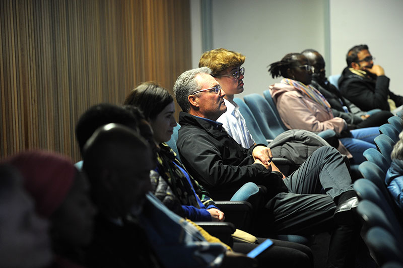 The audience listens attentively as Prof Edina Sinanovic discussed health economics in the South African context