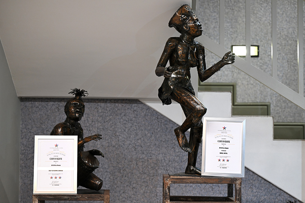 The two All Africa House grading certificates seen at the entrance of the establishment.