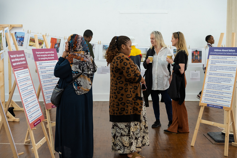 Attendees engaging with The Motherload exhibition