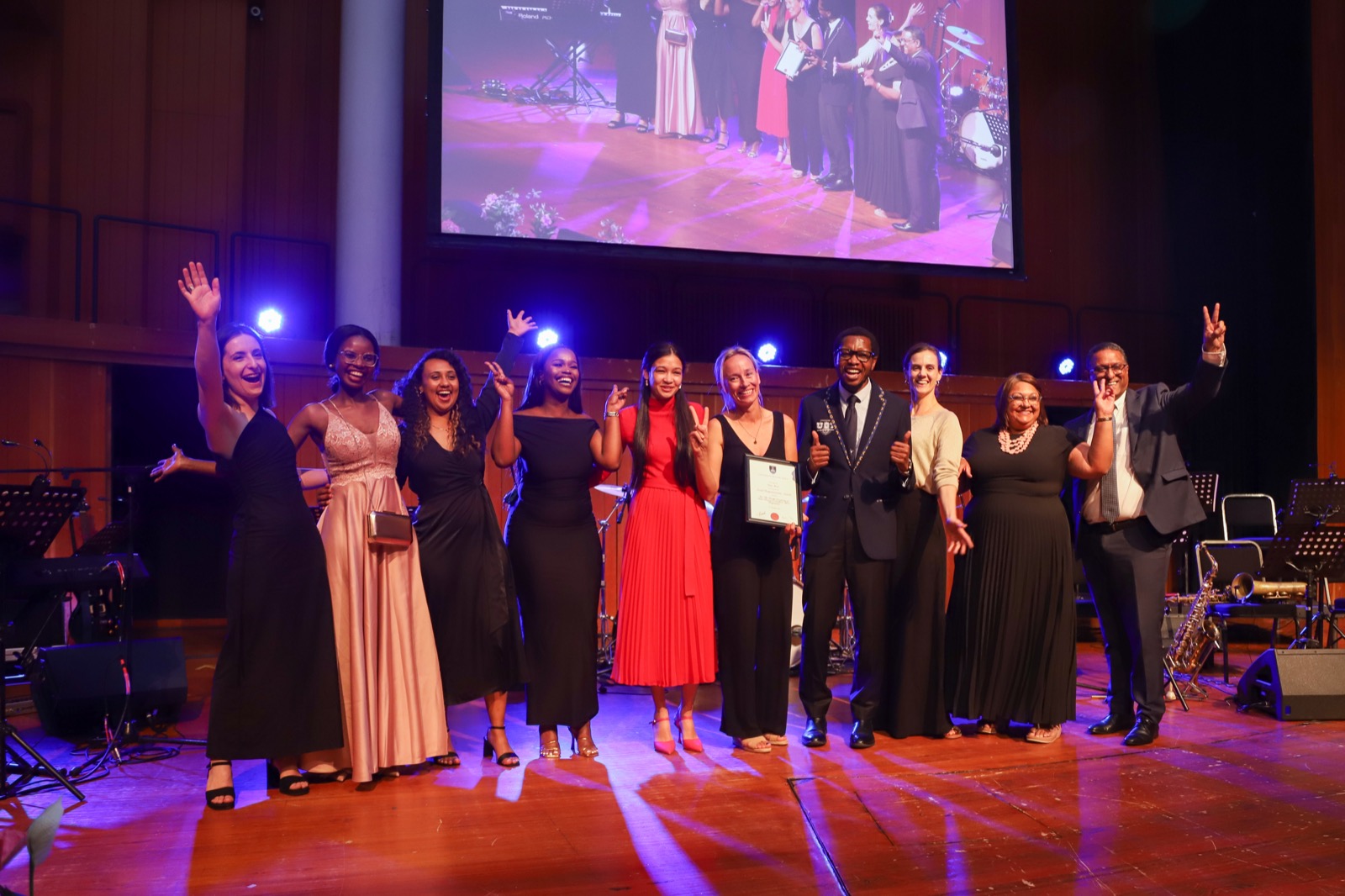 Prof Elena Moore (centre) and researchers from the Family Caregiving of Older Persons in Southern Africa receive their Social Responsiveness Award.