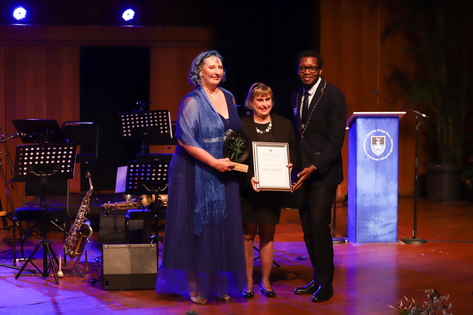 Representatives from The Department of Chemistry’s Occupational Health Safety and Environment unit receive their Service Excellence Award.